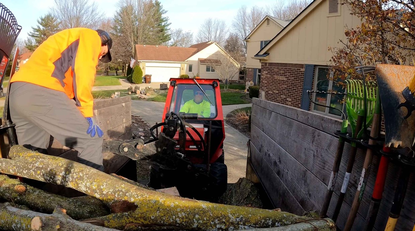 Stump grinding equipment removing tree stump in Edmond